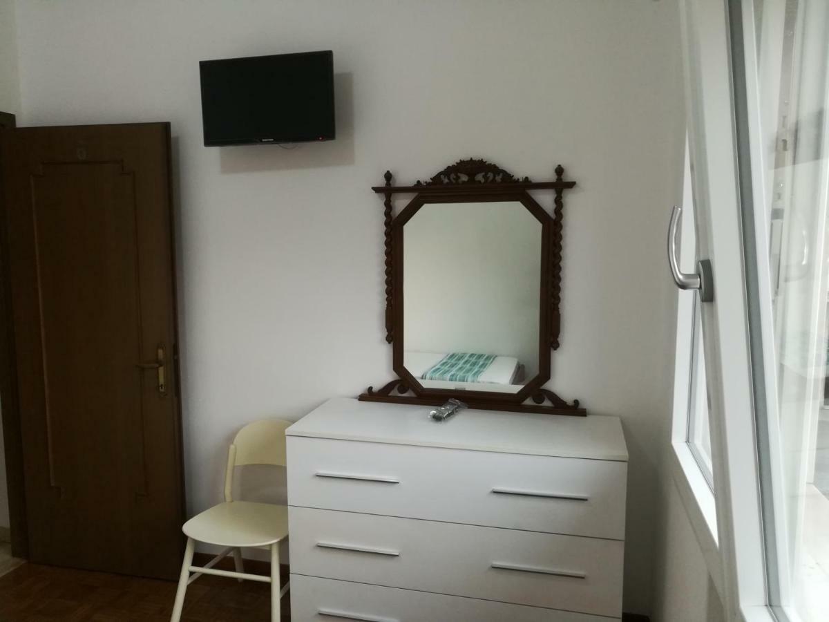 Camera Singola con Bagno in Comune